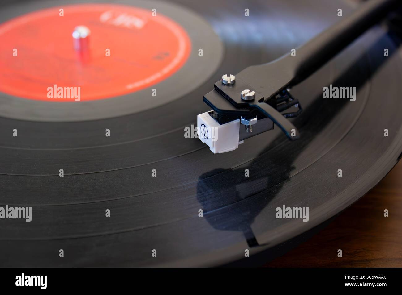 Record player stylus lowering to the vinyl Stock Photo - Alamy