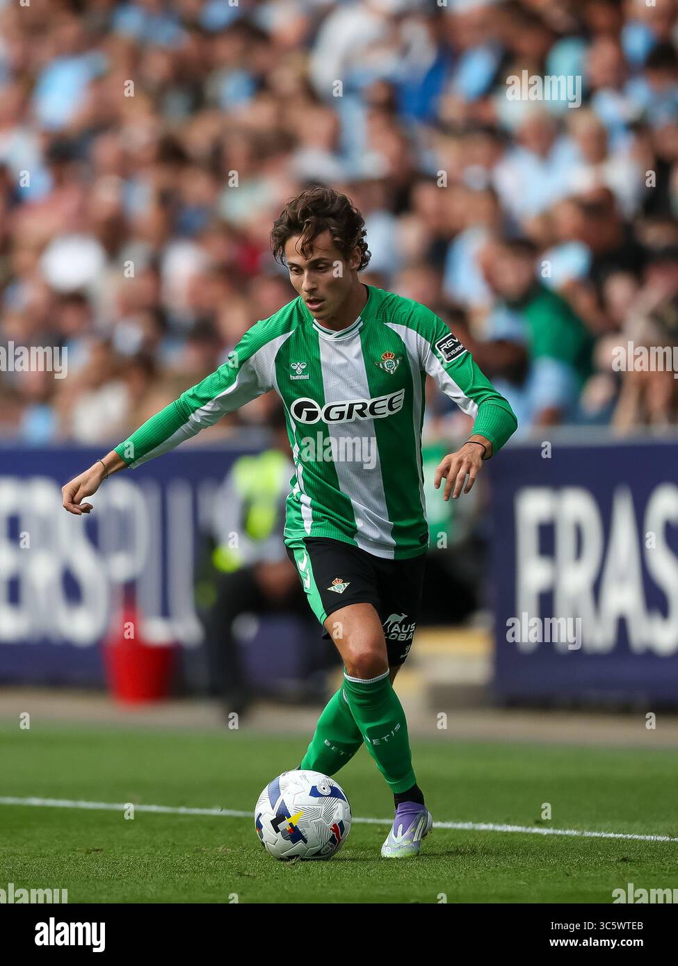 Rodrigo Riguelme Coventry, UK. 30th July 2025. Rodrigo Riquelme of Real Betis dribbles ...