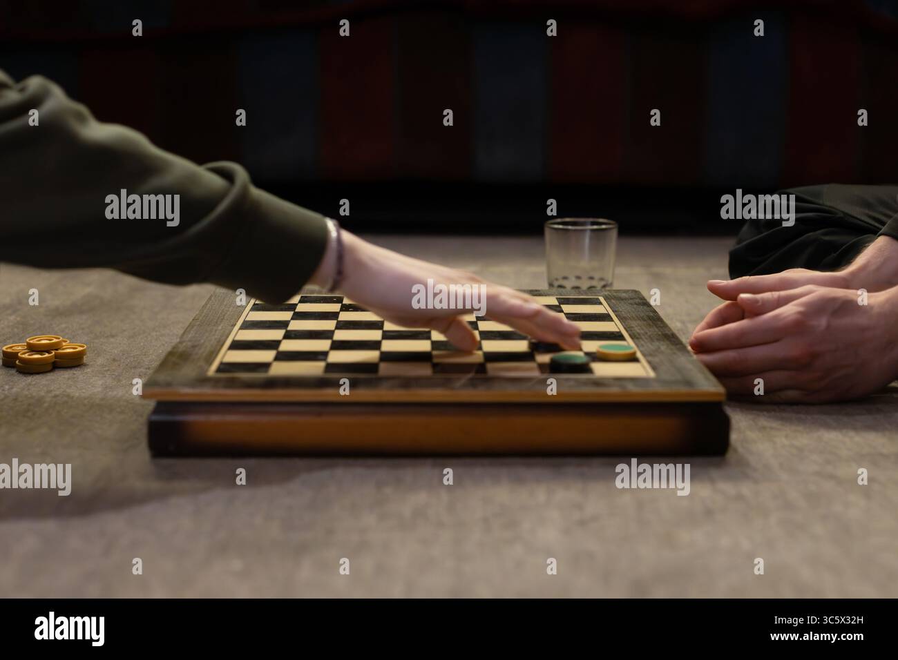 Realistic Moment of Checkers Gameplay Stock Photo