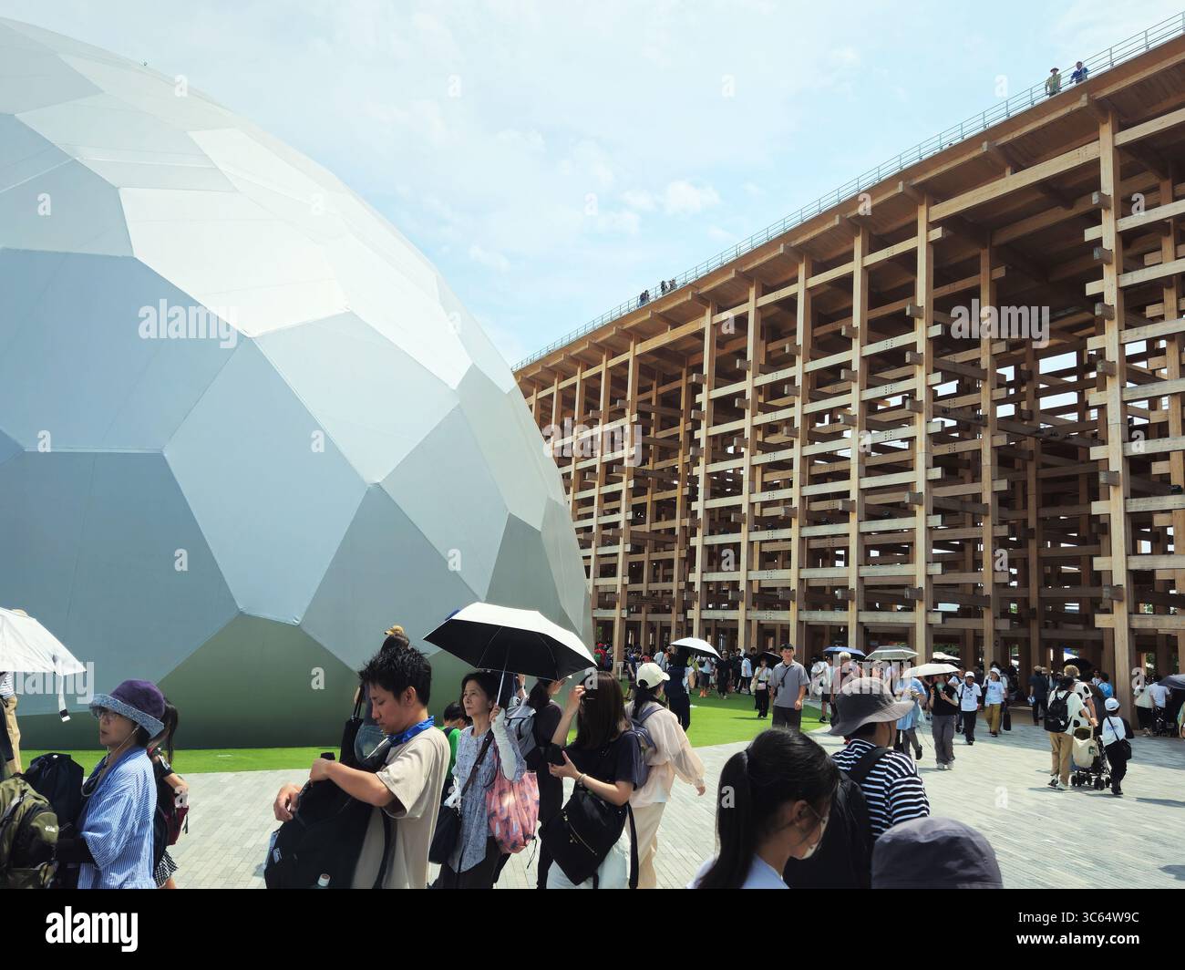 Crowds at Osaka Expo 2025 Wooden Pavilion and Geodesic Dome, Japan Stock Photo