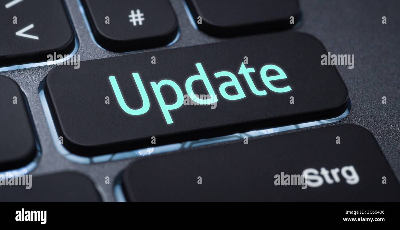 Illuminated keyboard with a labeled key - Update Stock Photo