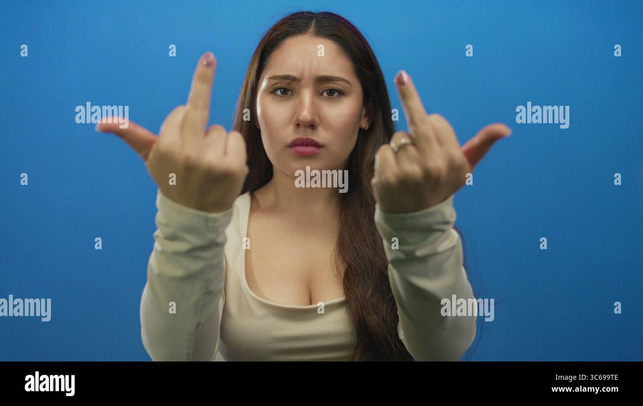Multipel Middle Finger Woman raises middle fingers hi-res stock photography and images - Alamy