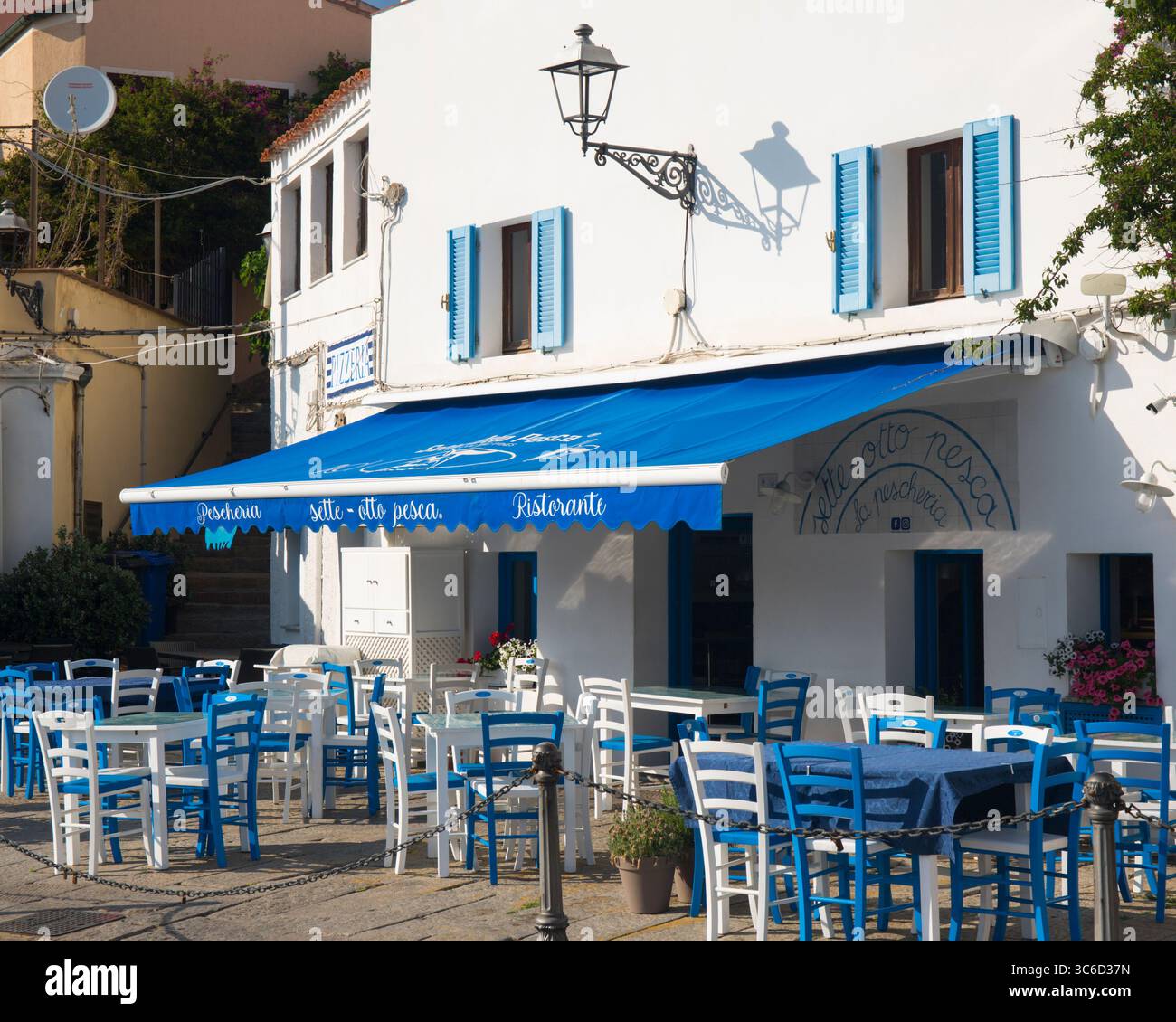 La Maddalena, La Maddalena Archipelago National Park, Gallura, Sardinia, Italy. Terrace of a typical fish restaurant on the Cala Gavetta waterfront. Stock Photo
