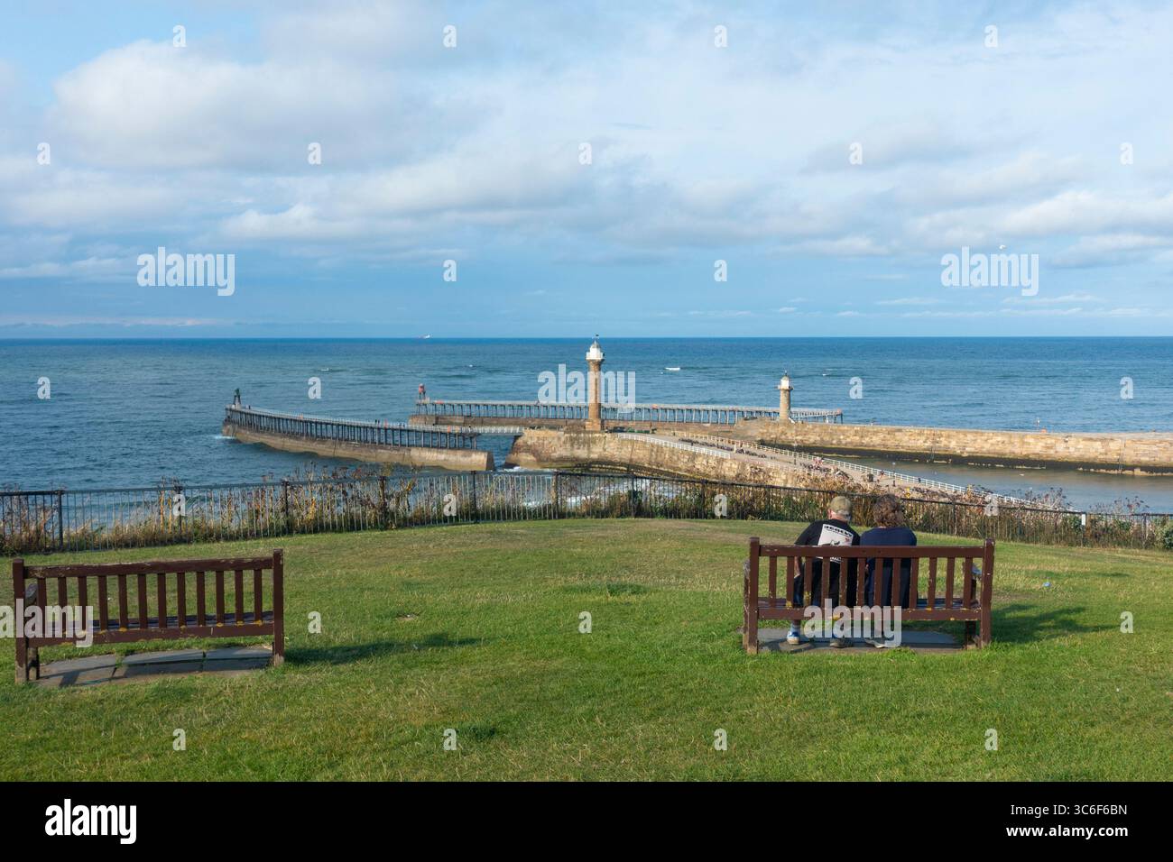 North York Moors National Park, England. UK. 31st July, 2025. People enjoying late afternoon sunshine at Whitby on the North Yorkshire coast. Credit: Alan Dawson/Alamy Live News Stock Photo