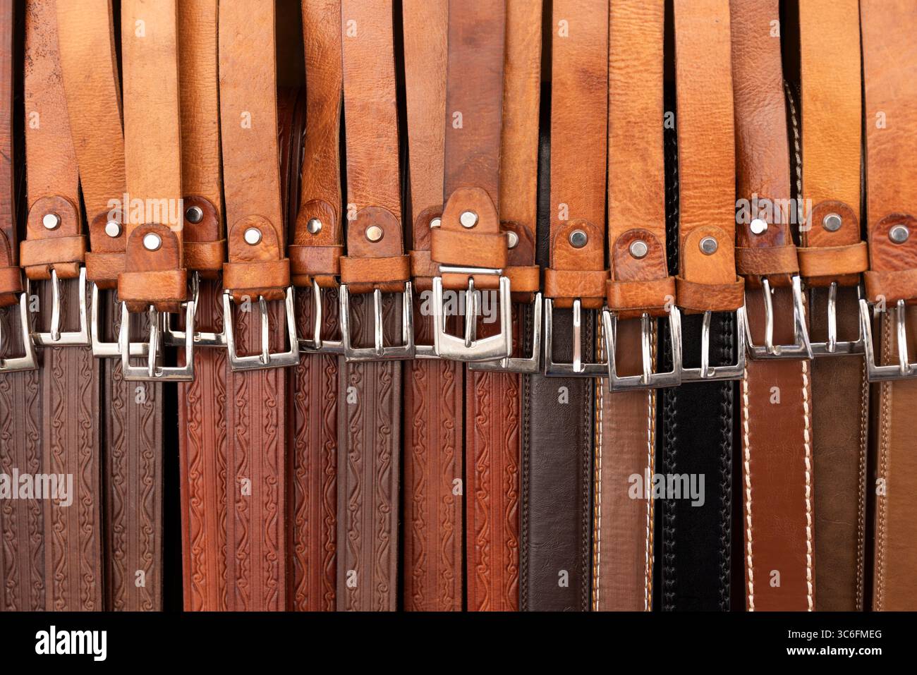 Selection of brown leather belts Stock Photo