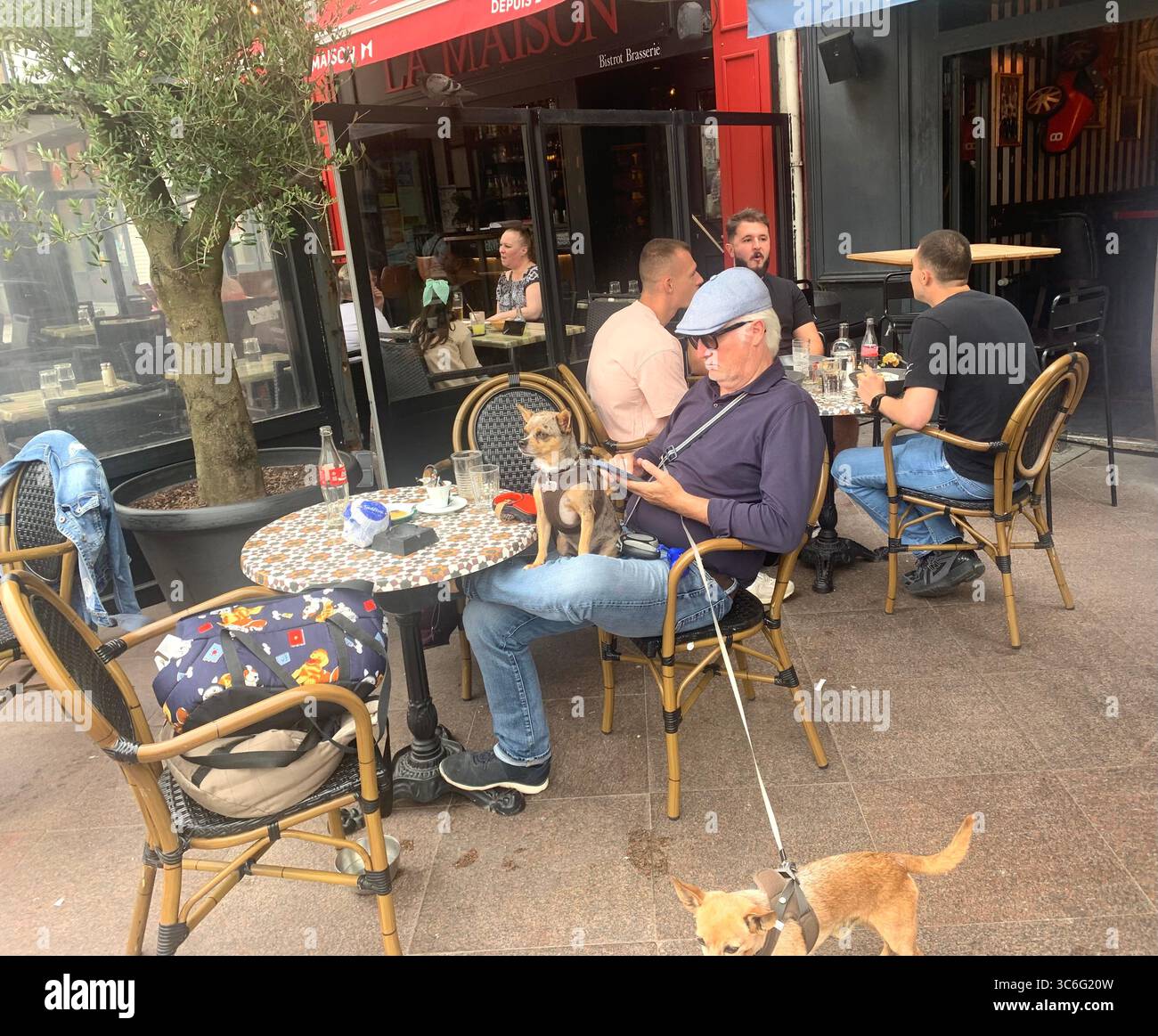 Boulogne Sur Mer France shop shops restaurant Restaurants Town place living street home Church eating outside out warm Sunny food place - Smartphone Captured Stock Image