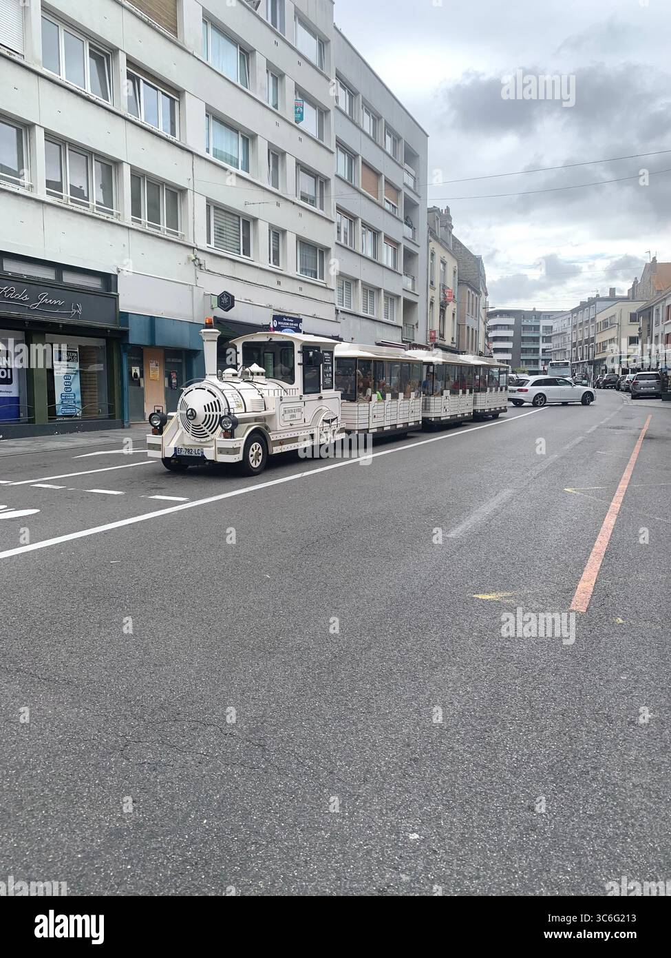 Boulogne Sur Mer France shop shops restaurant Restaurants Town place living street home Church eating outside out warm Sunny food place - Smartphone Captured Stock Image