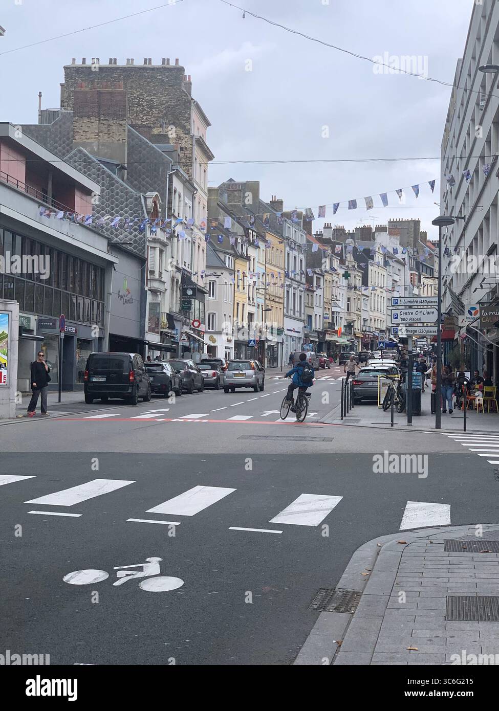 Boulogne Sur Mer France shop shops restaurant Restaurants Town place living street home Church eating outside out warm Sunny food place - Smartphone Captured Stock Image
