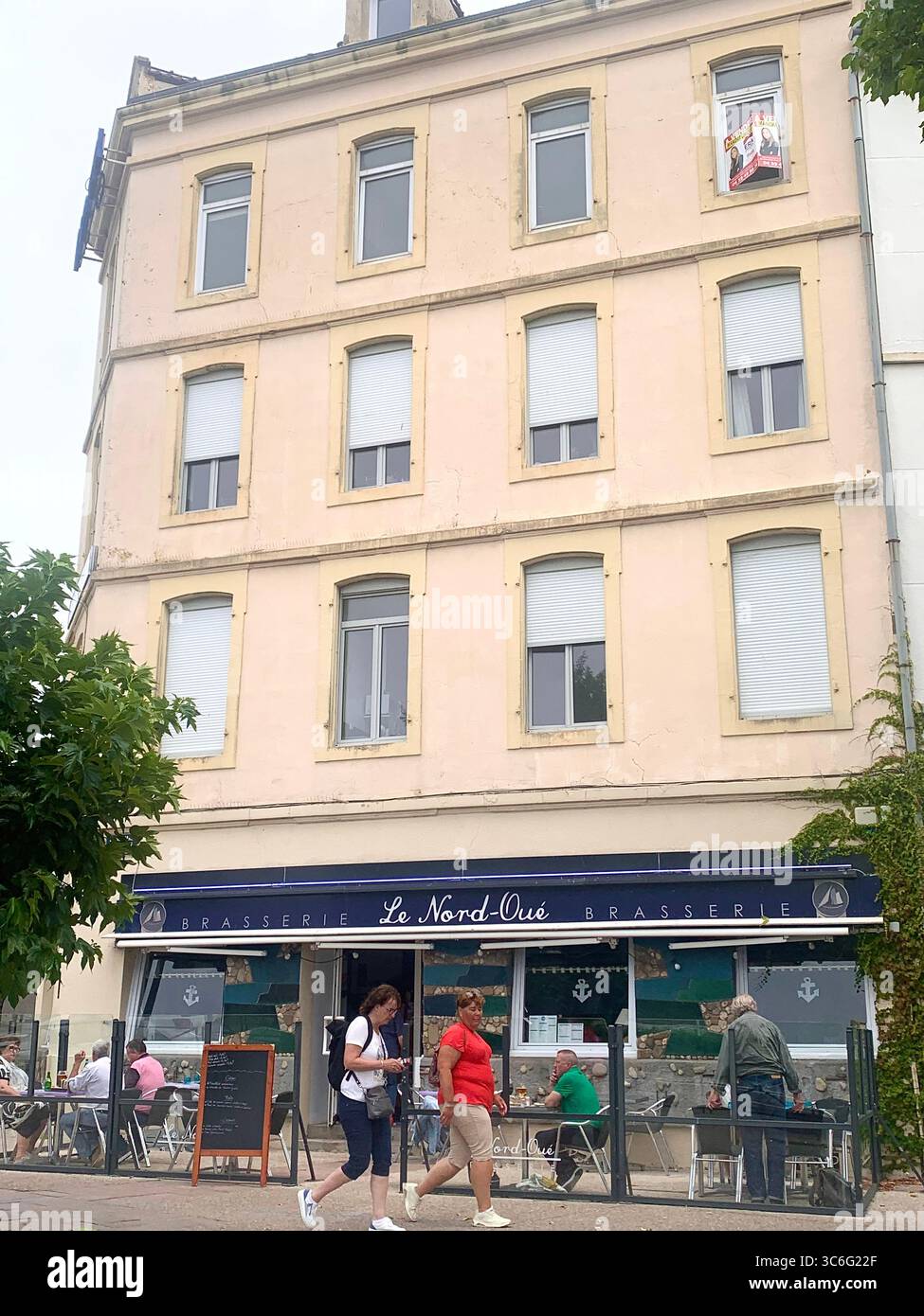 Boulogne Sur Mer France shop shops restaurant Restaurants Town place living street home Church eating outside out warm Sunny food place - Smartphone Captured Stock Image