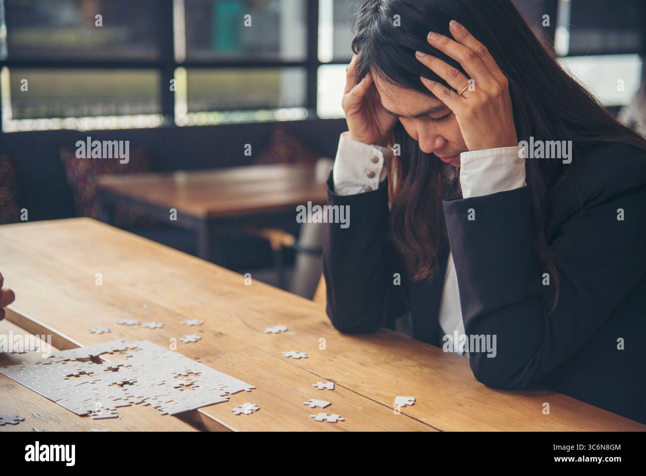 Asian businesswoman overworked at office stressful anxiety with serious problems. Woman exhaustion depress and mental burnout feeling tired frustrate Stock Photo