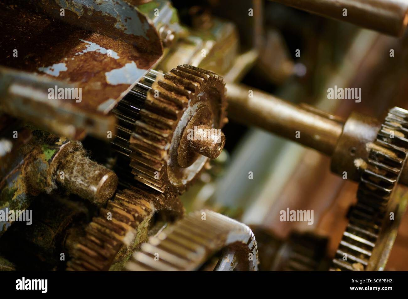 Intricate details of an antique machinery in a rustic workshop ...