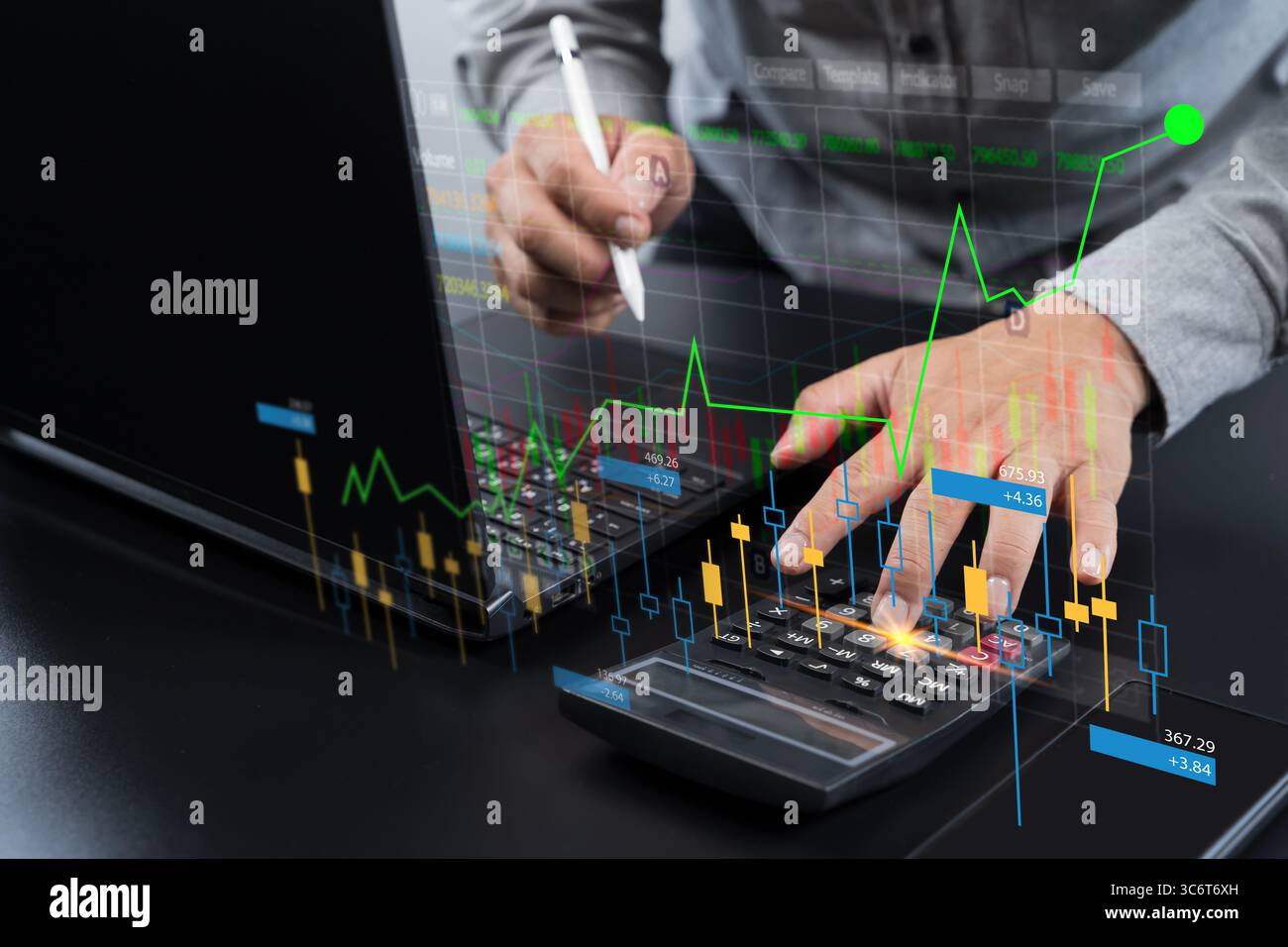 Businessman analyzing stock market chart and financial data using laptop and calculator. Digital candlestick graph overlay represents investment, trad Stock Photo