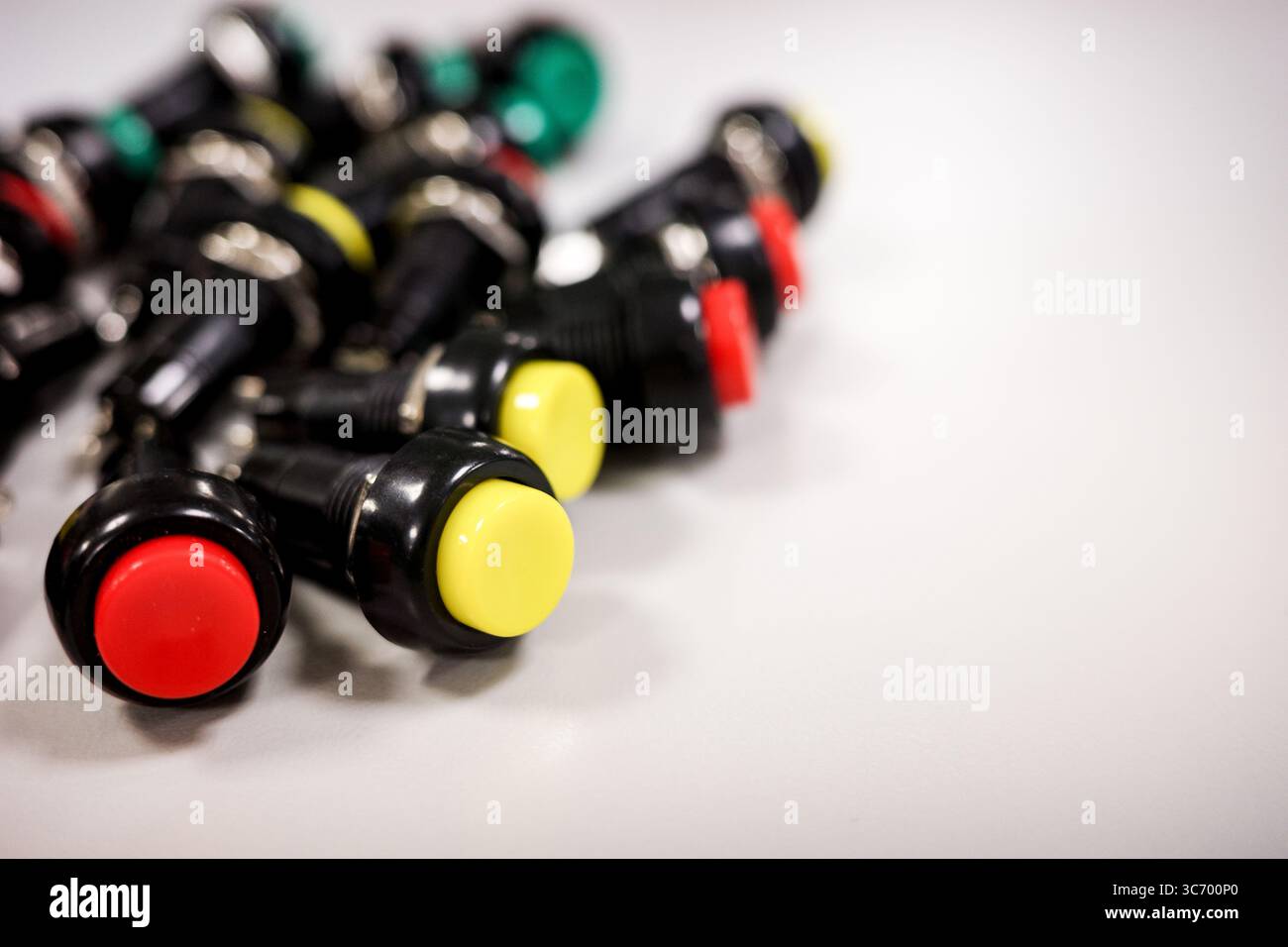 Electronic push buttons on white background Stock Photo