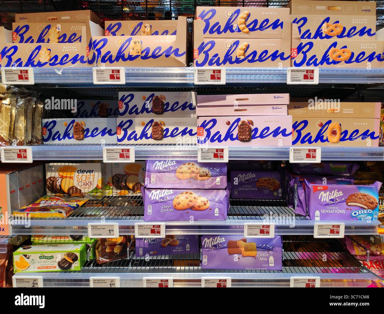 KLAGENFURT, AUSTRIA - AUGUST 12, 2022: Sweet cookies section in a supermarket in Austria. Cookies under Bahlsen, Milka, Griesson and Clever brands. Stock Photo