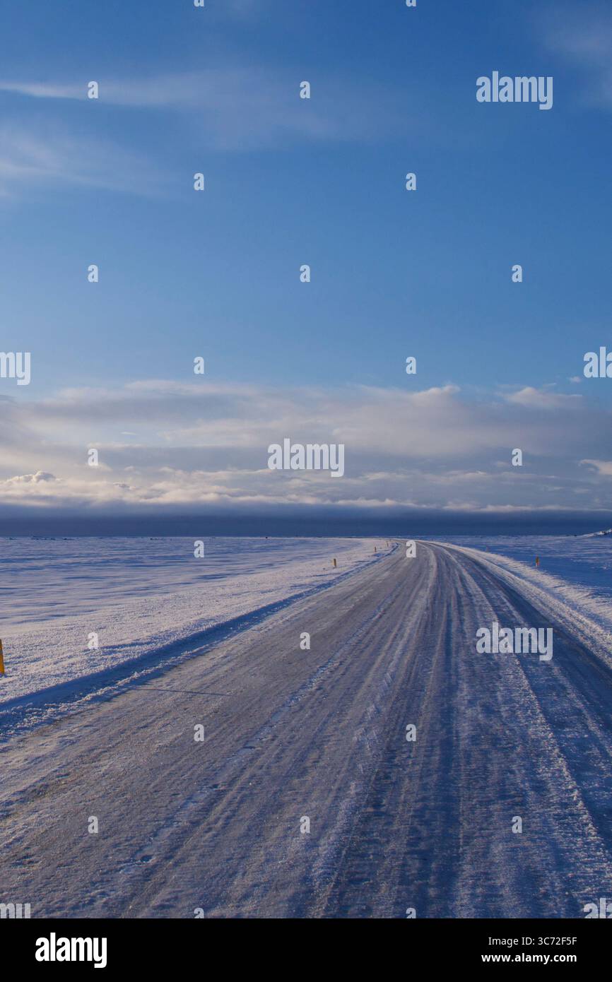Empty road covered in snow hi-res stock photography and images - Alamy