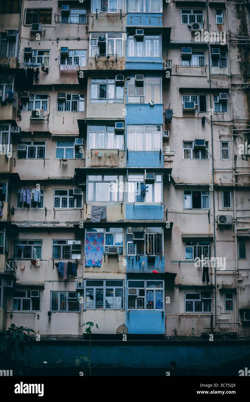 Dense cluster of high-rise residential buildings at 山海樓, a famous urban photography spot in Hong Kong known for its striking architectural patterns. Stock Photo
