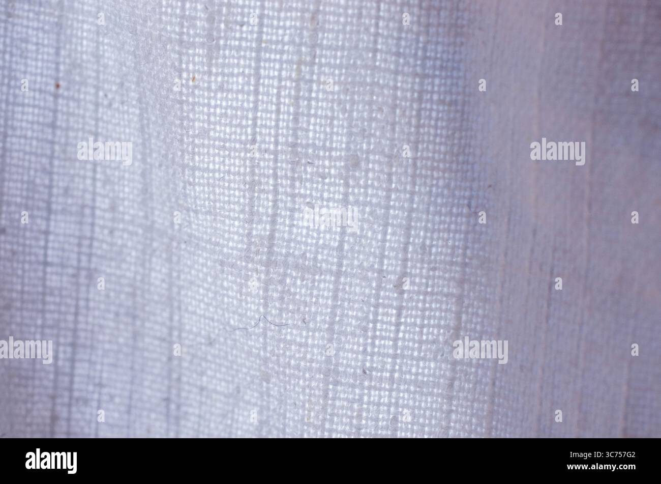 Close-up of white woven linen fabric texture Stock Photo