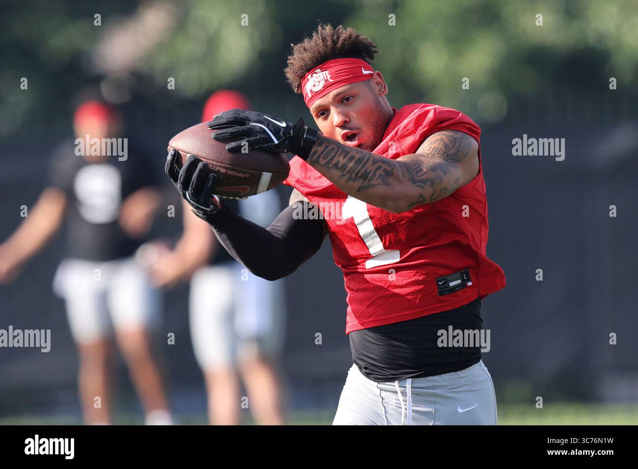 Ohio State wide receiver Brandon Inniss participates in a drill during ...