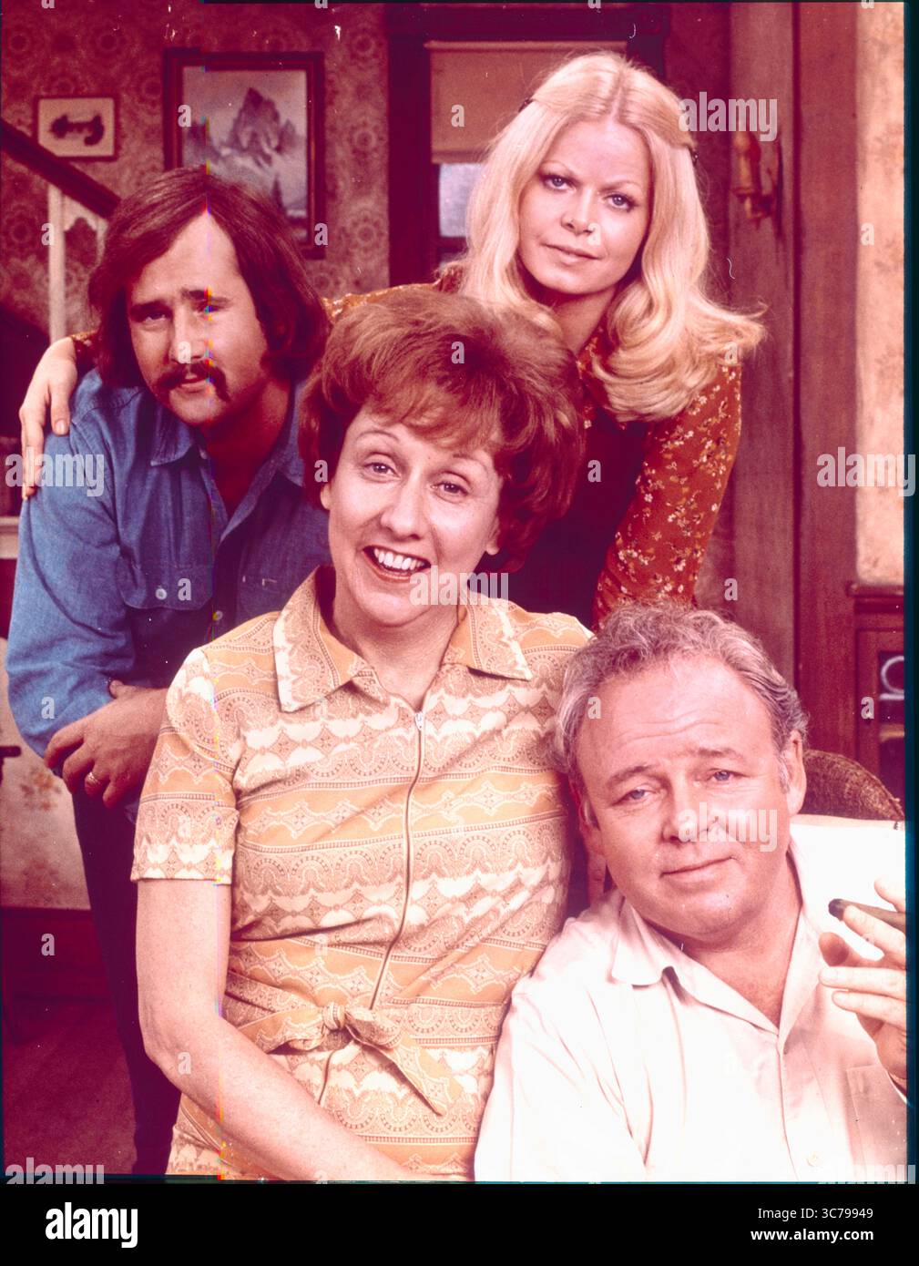 RELEASE DATE: 1971 TITLE: All In The Family: CBS PLOT: All In The Family revolves around the life of a working-class man and his family. It broke ground by introducing challenging and complex issues into mainstream network television comedy: racism, antisemitism, infidelity, homosexuality, women's liberation, rape, religion, miscarriage, abortion, breast cancer, the Vietnam War, menopause, divorce, and impotence. The series became arguably one of television's most influential comedies, as it injected the sitcom format with more dramatic moments and realistic, topical conflicts. STARRING: (bott Stock Photo