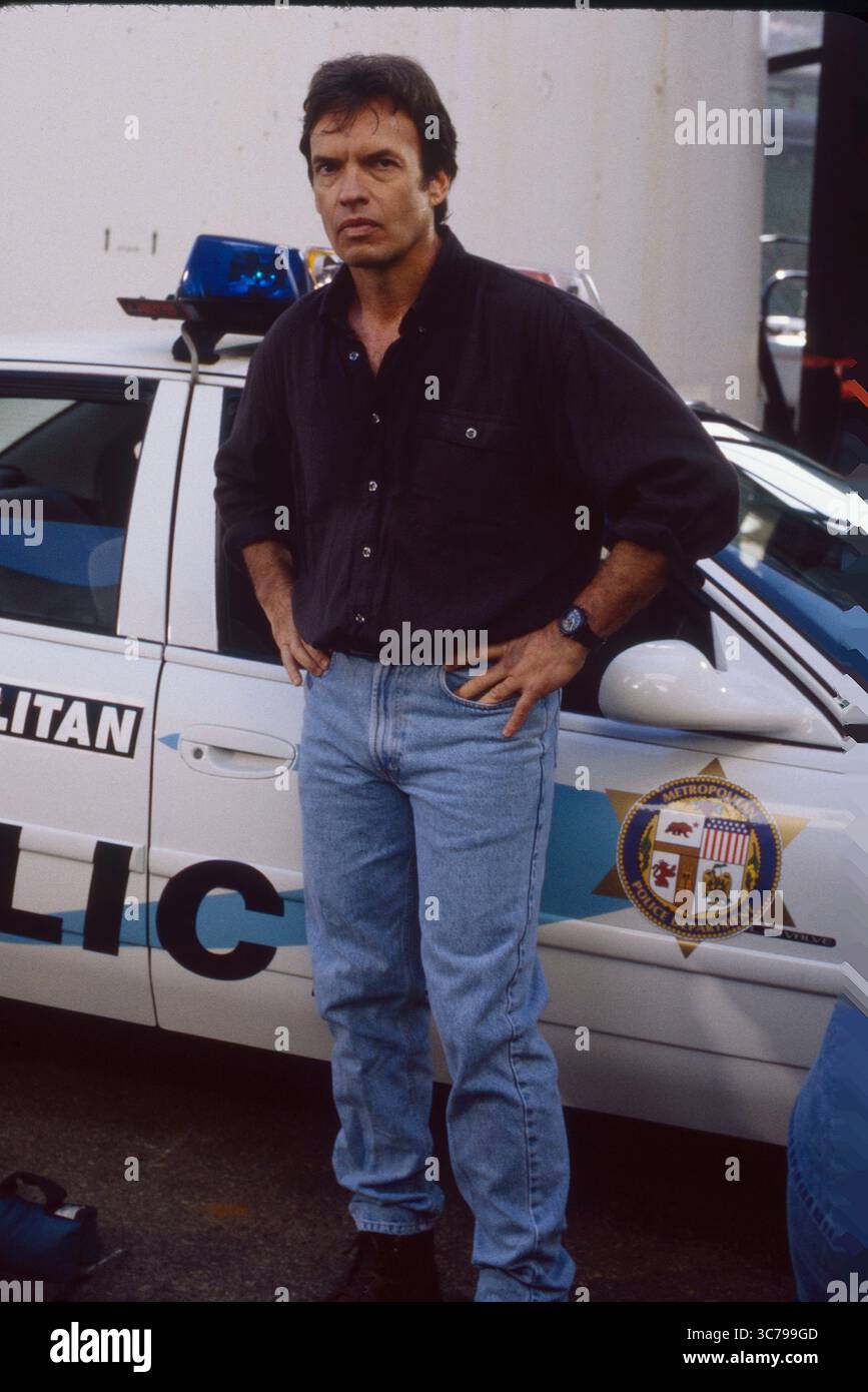 RELEASE DATE: 1998 TITLE: Alien Nation STUDIO: Fox Broadcasting PLOT: The franchise is set in the near future in the United States. In 1991 a flying saucer crashes in the Mojave Desert containing a race of extraterrestrials, the Tenctonese (called Newcomers by humanity) escaping from slavery under a cruel Overseer race. They resemble humans but have various anatomical differences and have been bred to have greater physical strength and intelligence. The Newcomers are accepted as the latest immigrants to America, and the franchise explores issues around their integration into the multicultural Stock Photo