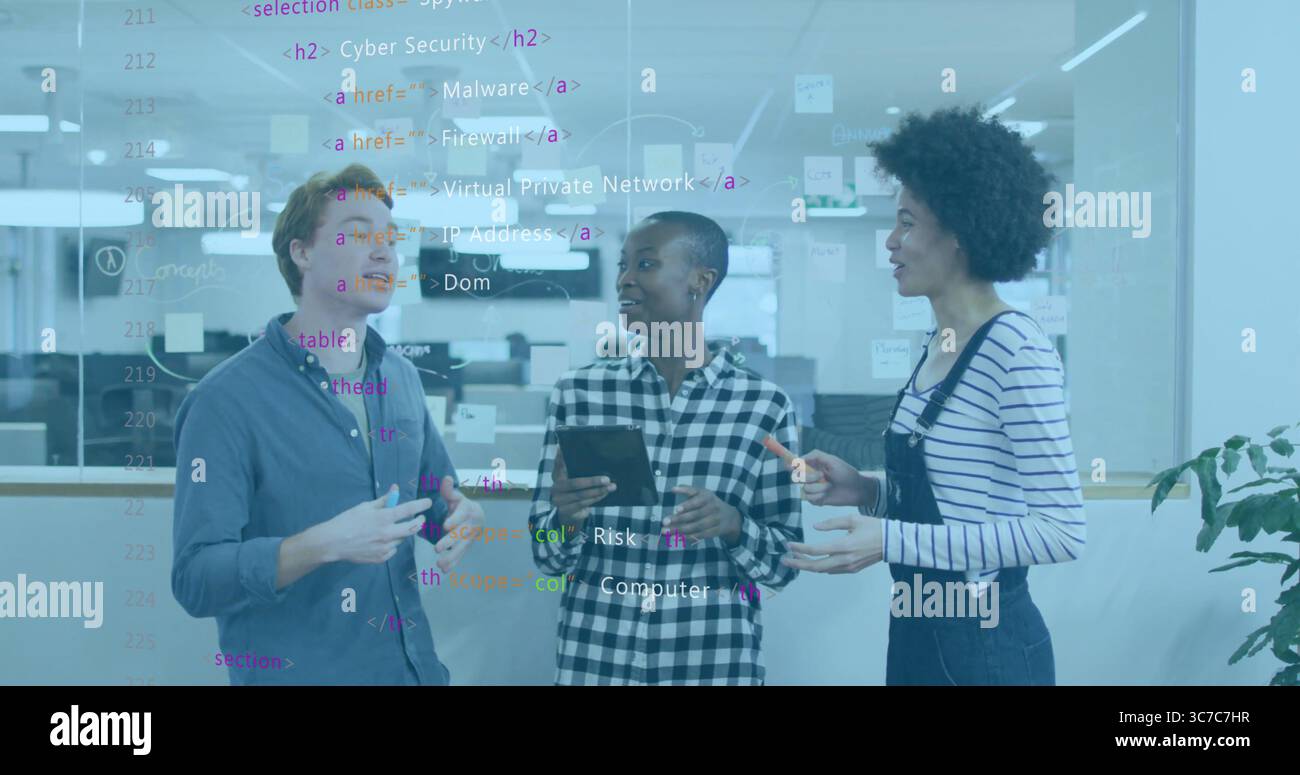 Collaborating IT professionals analyzing code on glass partition in office with tablet marker pen Stock Photo