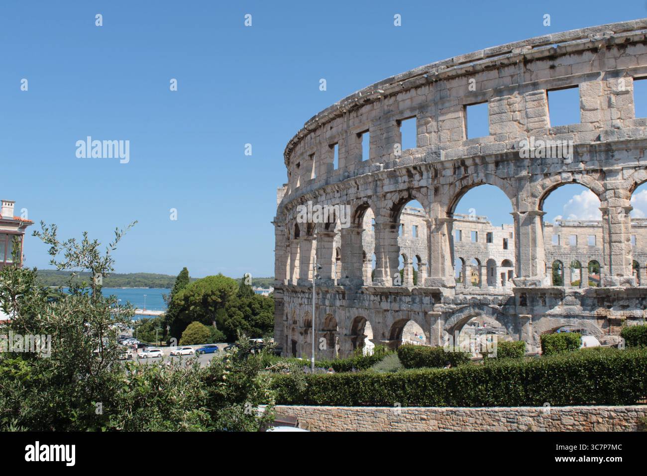 The Pula Arena from the mainland Stock Photo - Alamy