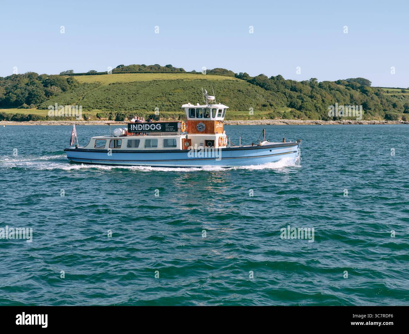 A summer passenger ferry in Falmouth Bay on a summers day Falmouth, Cornwall England UK Stock Photo