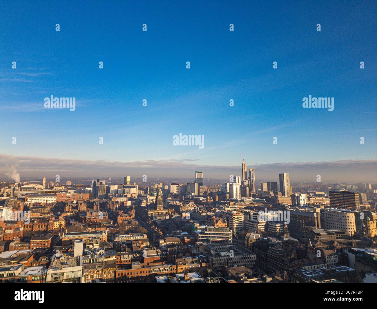 Aerial photo of Leeds city centre skyline showing high‑rise buildings, historic landmarks, and urban development, West Yorkshire, England. Stock Photo