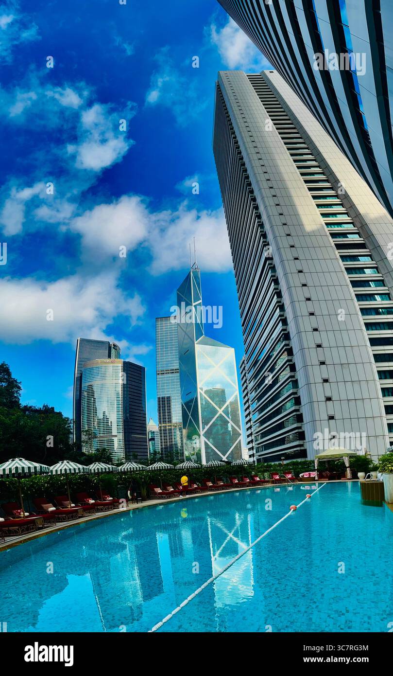 The Bank of China tower viewed from the swimming pool of the Shangri-La hotel in Hong Kong. - Smartphone Captured Stock Image