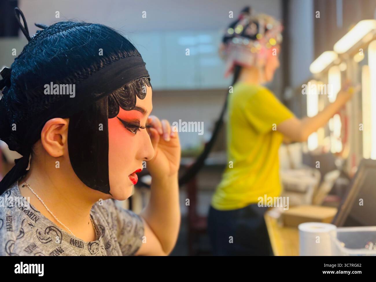 Chinese Kunqu opera performers get ready for the show. - Smartphone Captured Stock Image
