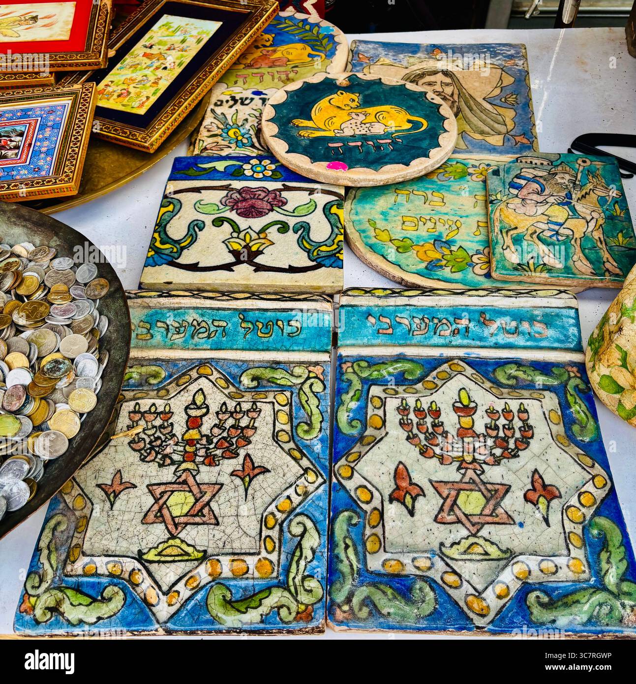 Jewish artifacts displayed by a vendor at the flea market in Jaffa, Israel. - Smartphone Captured Stock Image