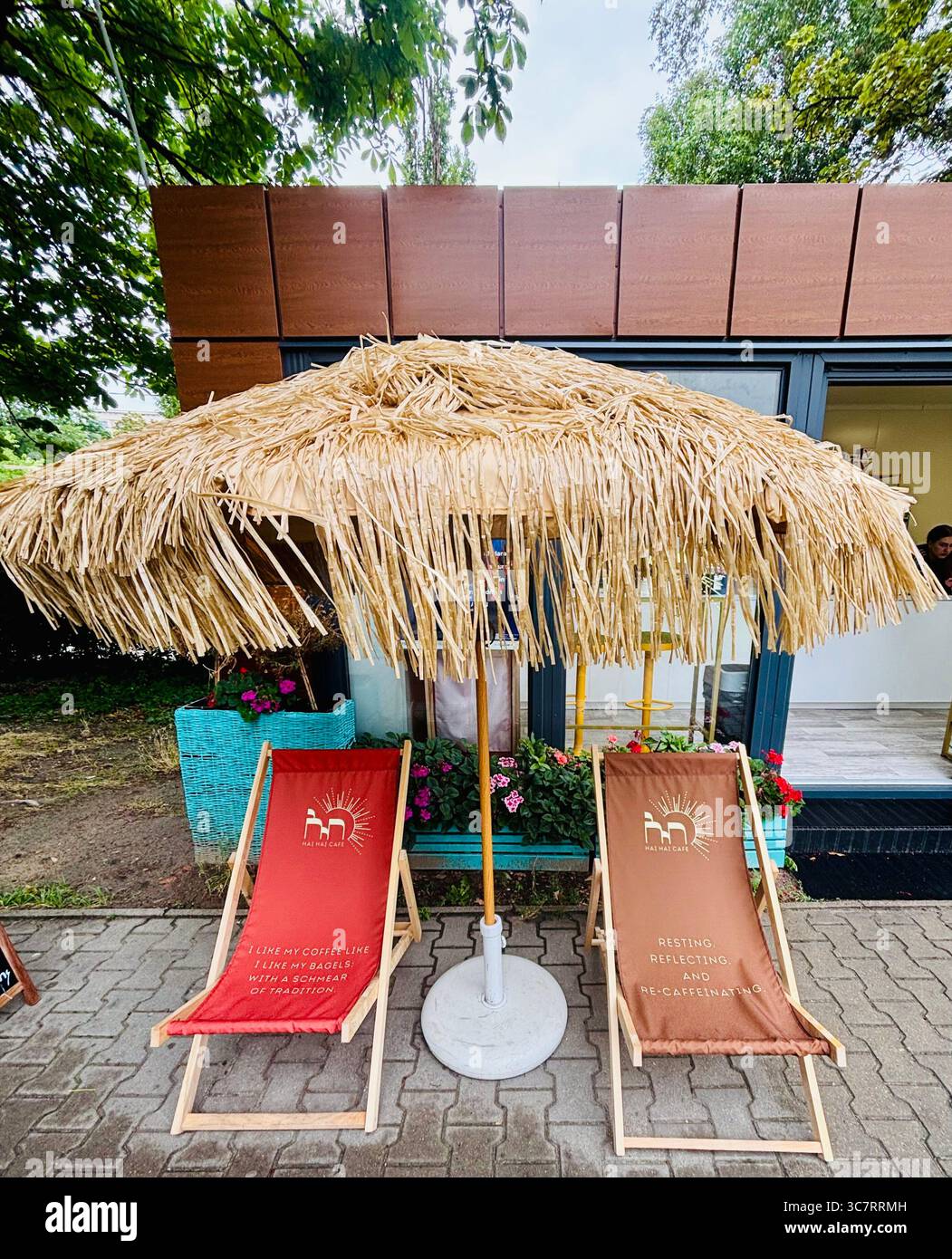 Beach chairs outside the Kosher Cafe near the Synagogue in Warsaw, Poland. - Smartphone Captured Stock Image