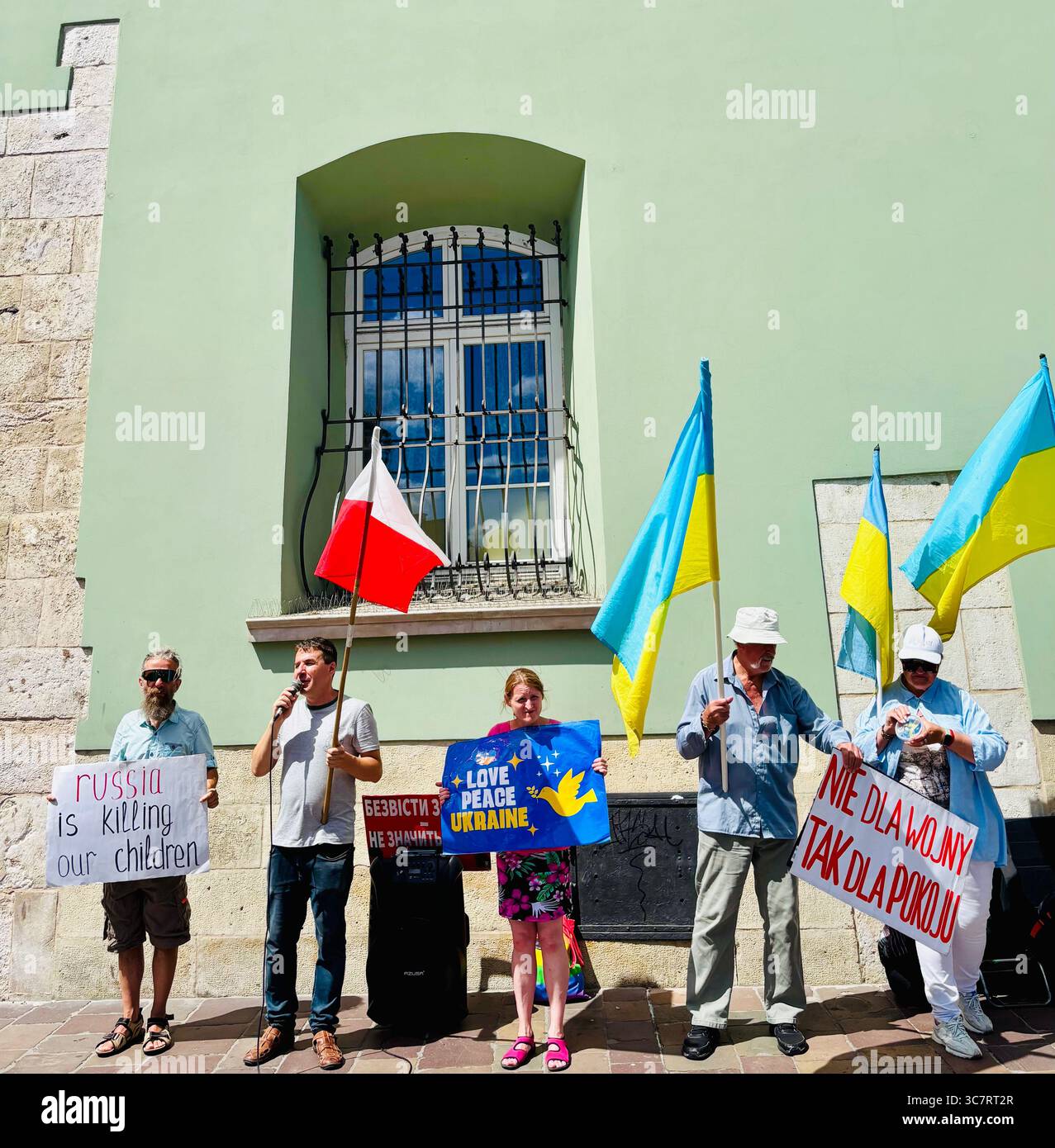 A protest supporting Ukraine in the old town of Krakow, Poland. - Smartphone Captured Stock Image