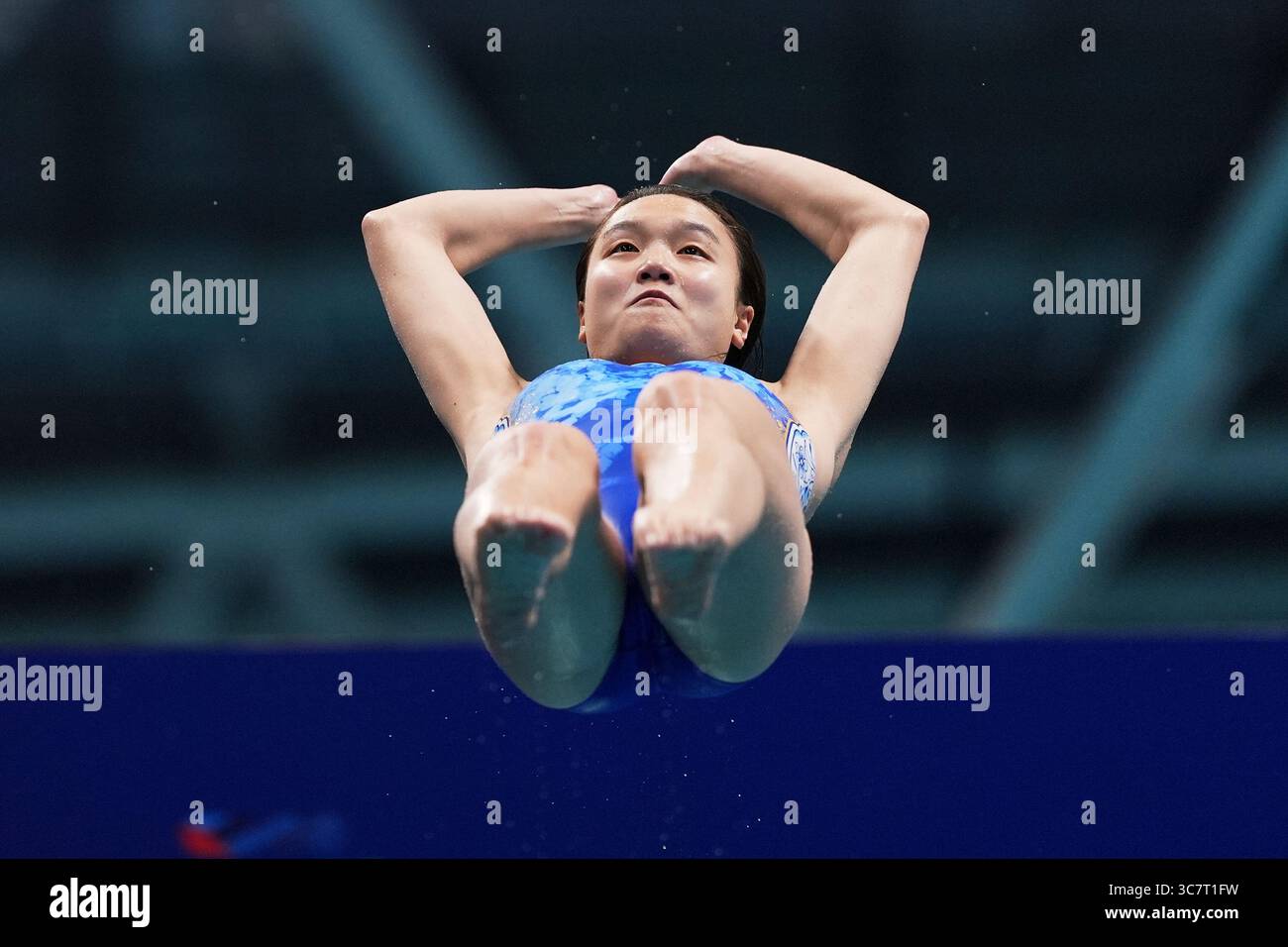 Chen Jia of China competes in the women's 3m springboard finals at the ...