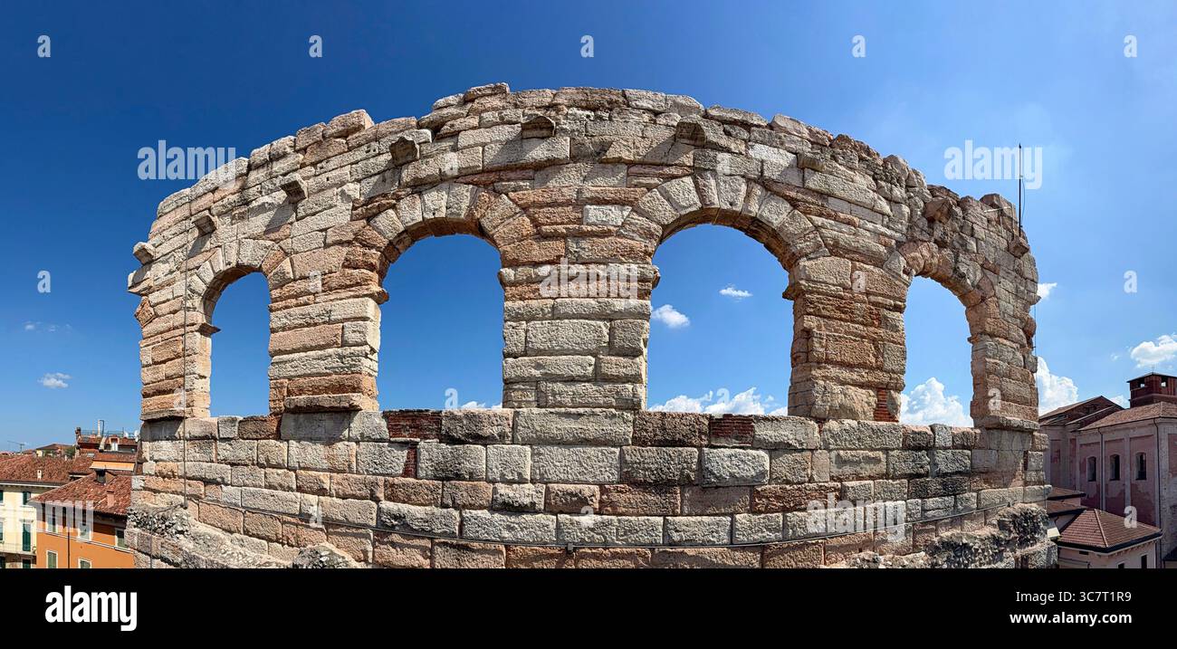 Verona Arena arches. Remains of Roman amphitheater against a blue sky in Verona, Italy - Smartphone Captured Stock Image