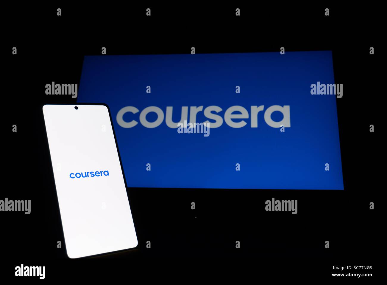 Coursera educational platform logo is described on a screen. Oghuz, Azerbaijan. 11.07.2025. Stock Photo