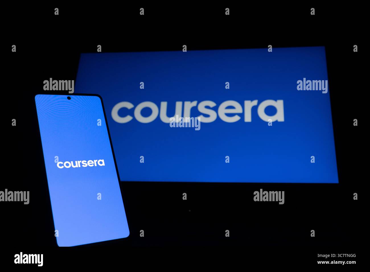 Coursera educational platform logo is described on a screen. Oghuz, Azerbaijan. 11.07.2025. Stock Photo