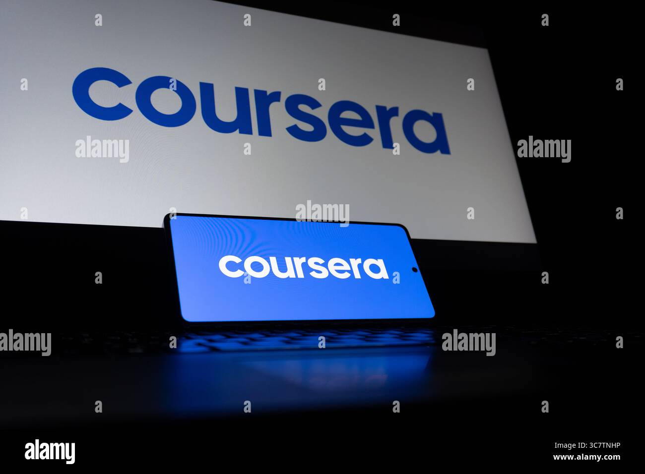 Coursera educational platform logo is described on a screen. Oghuz, Azerbaijan. 11.07.2025. Stock Photo