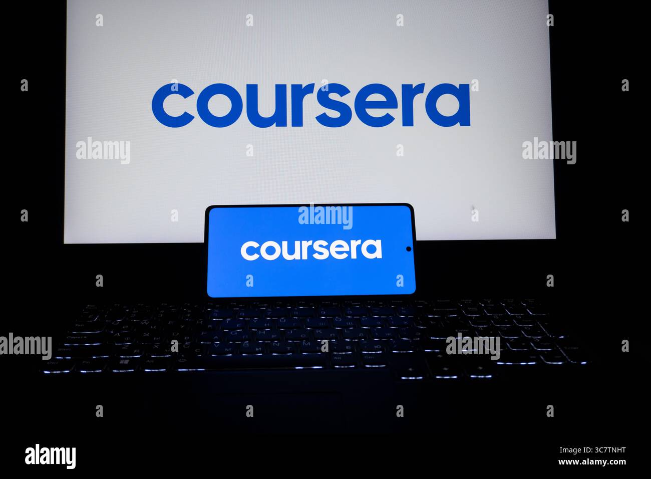Coursera educational platform logo is described on a screen. Oghuz, Azerbaijan. 11.07.2025. Stock Photo