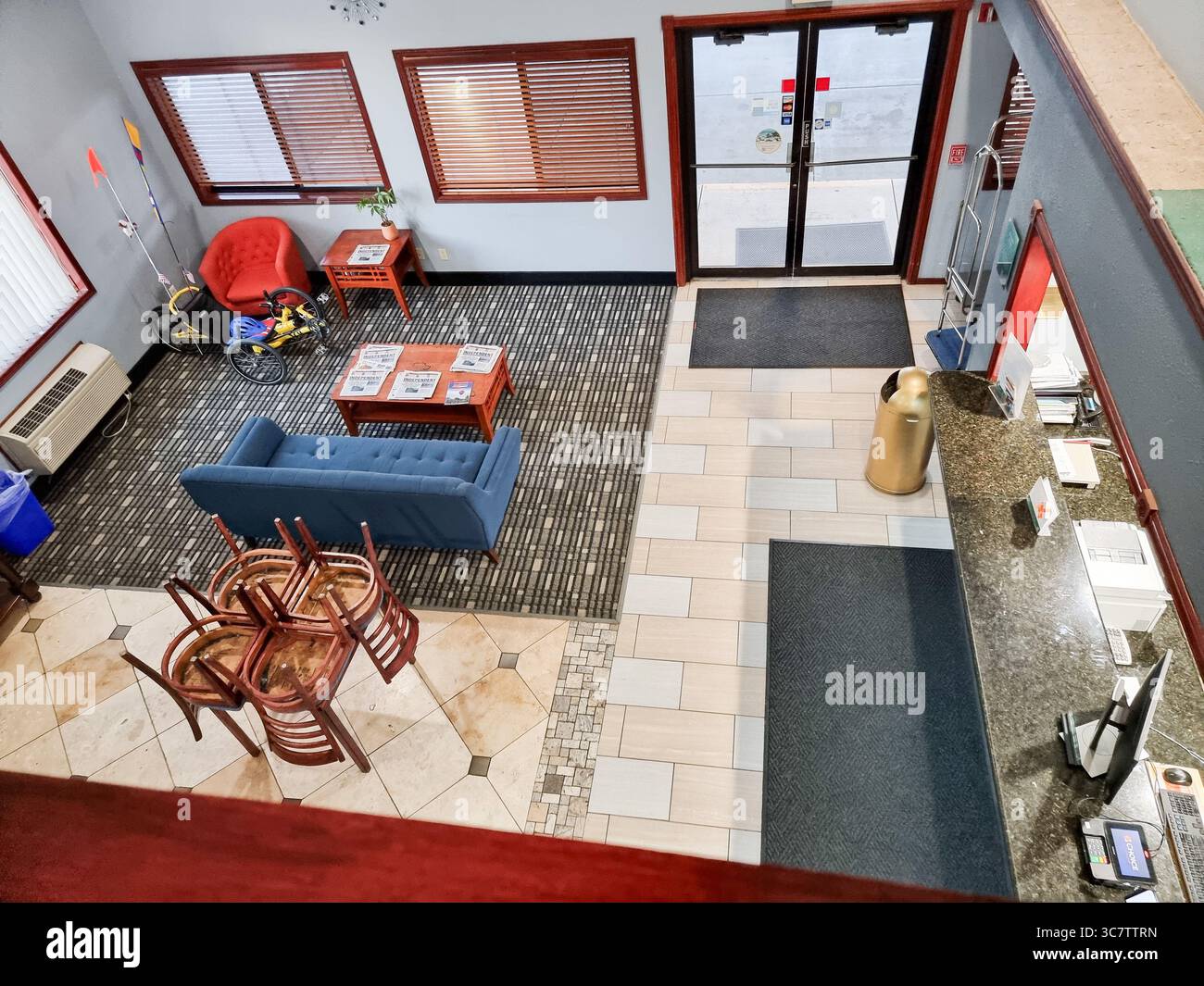 Top view of a hotel lobby with reception and entrance; seen from above - Smartphone Captured Stock Image