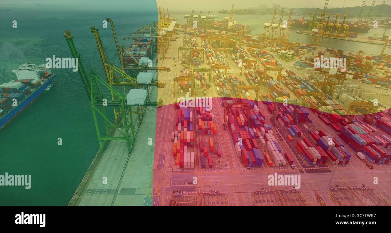 Showing aerial seaport quay with colorful containers, green gantry ...