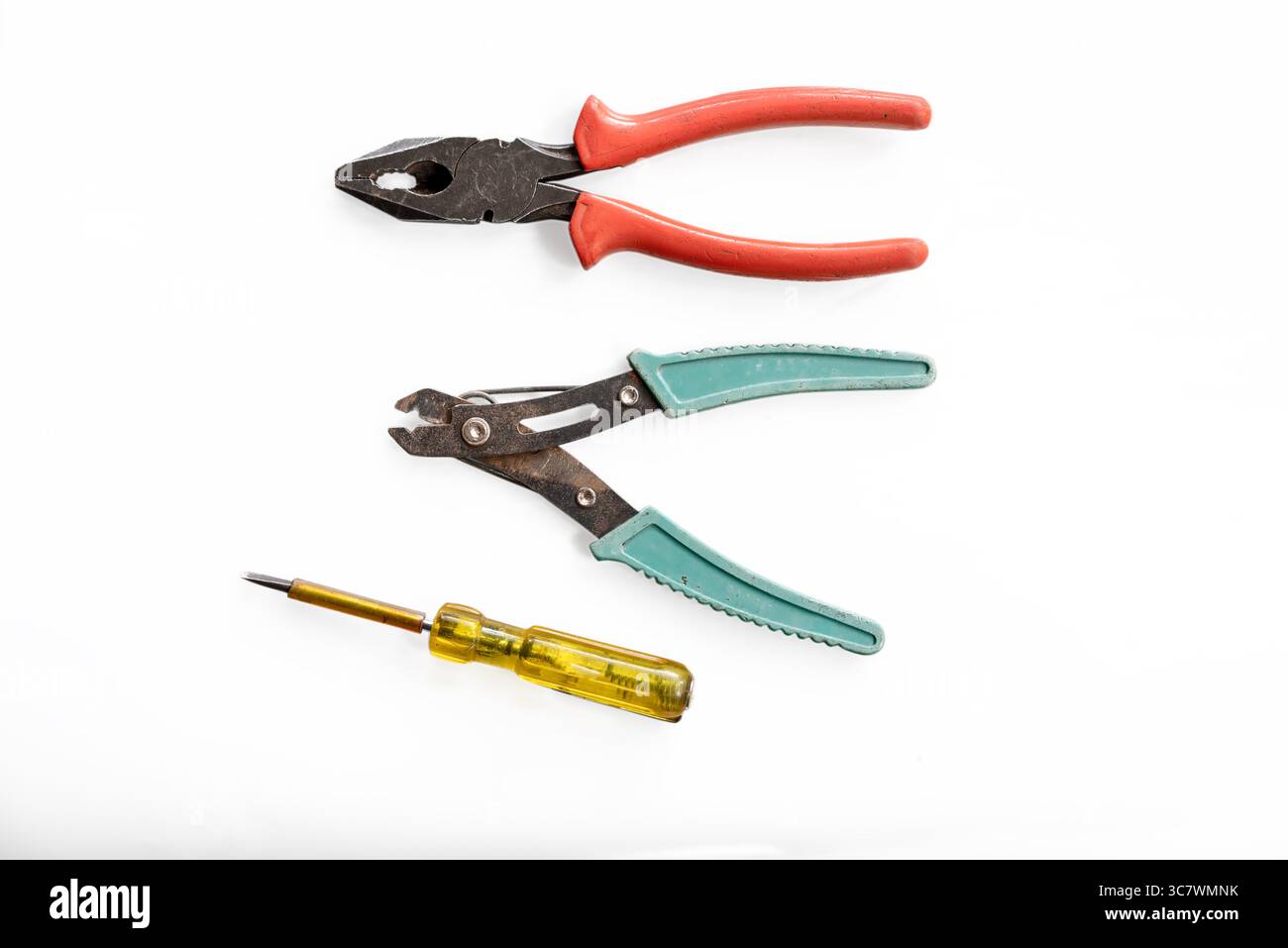 Pliers,Tester and wire cutter isolated on white background Stock Photo
