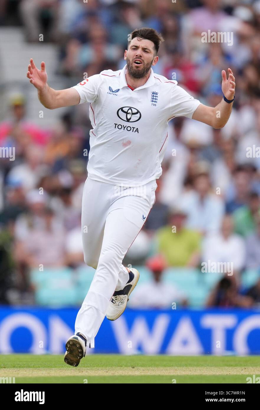 England's Jamie Overton reacts to a dropped catch on day three of the ...