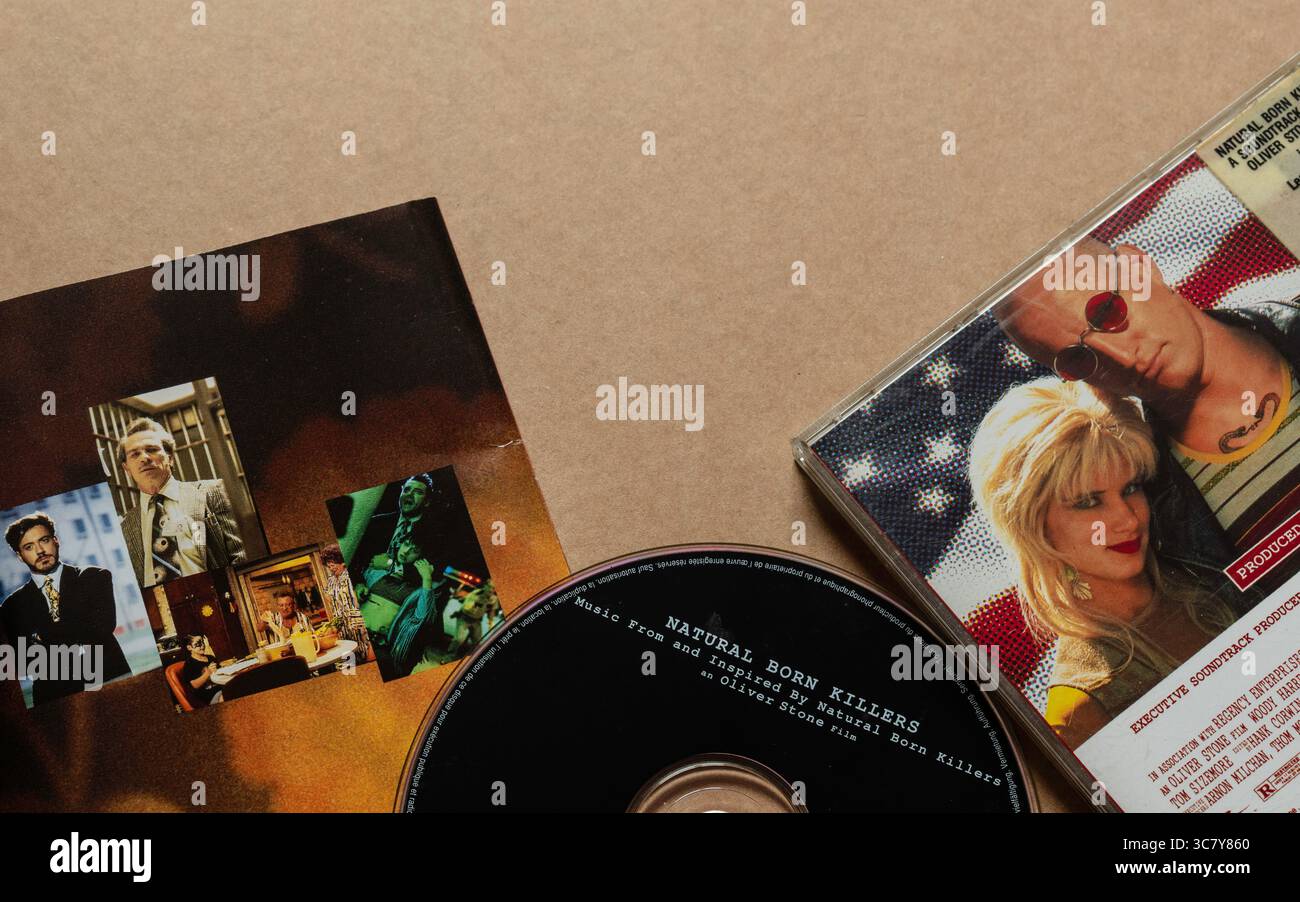 'Natural Born Killers' movie soundtrack CD with album cover and movie stills isolated on blank background Stock Photo