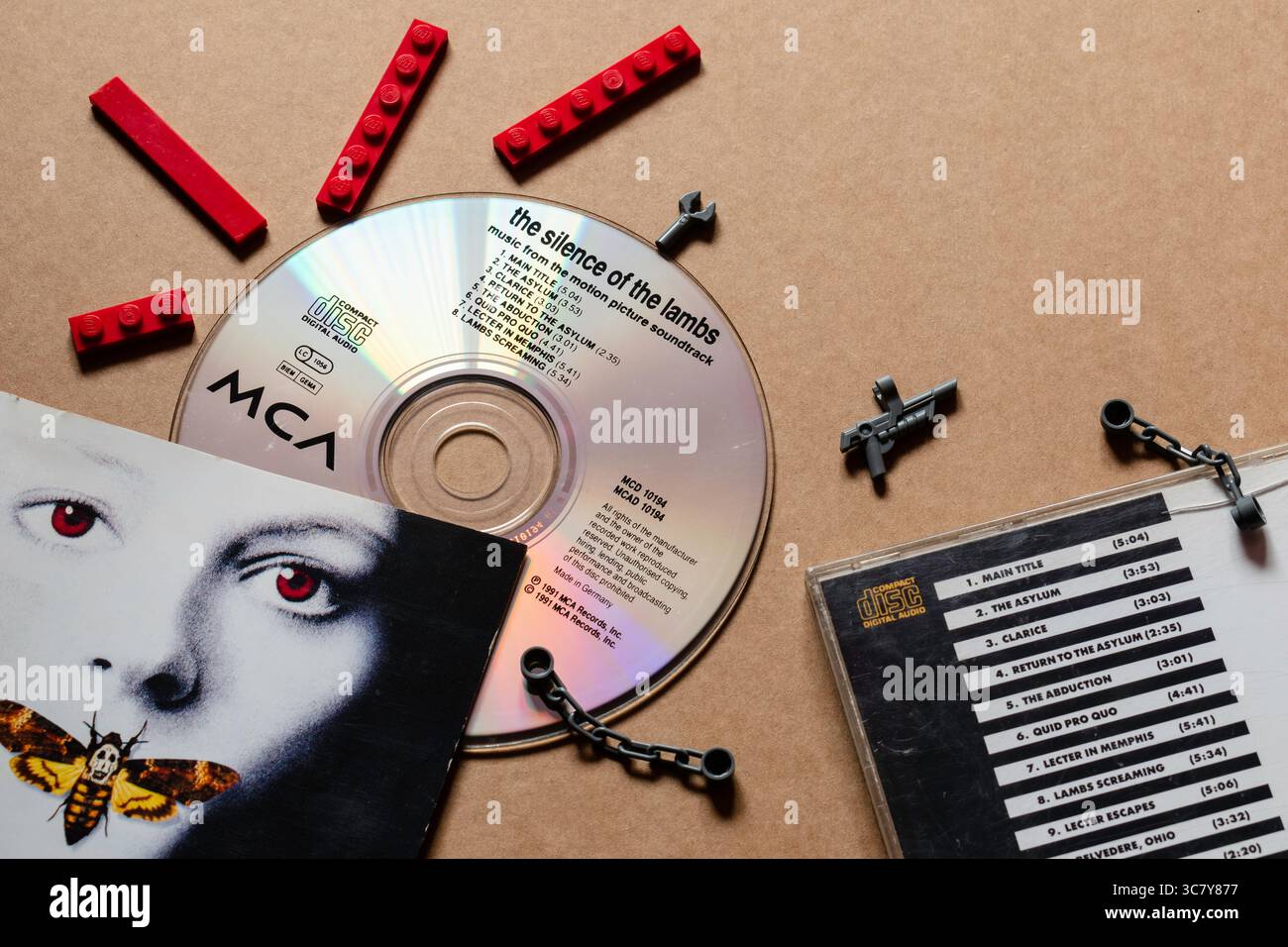 'The Silence of the Lambs' movie soundtrack CD with album cover featuring tracklist, isolated on blank background, top angle shot Stock Photo