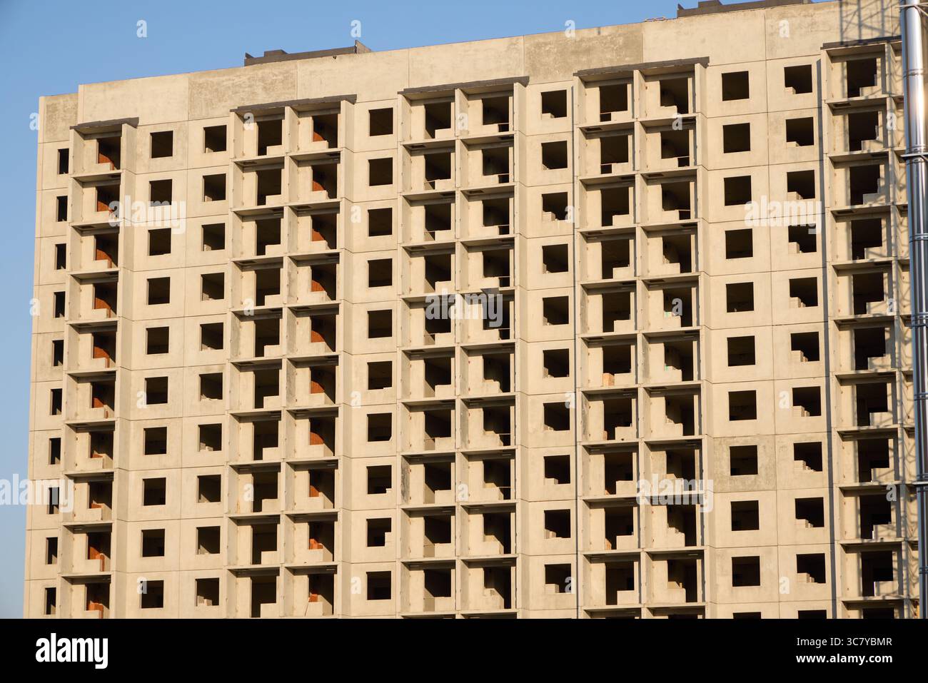 A Modern Building is Under Construction featuring Open Windows and an ...