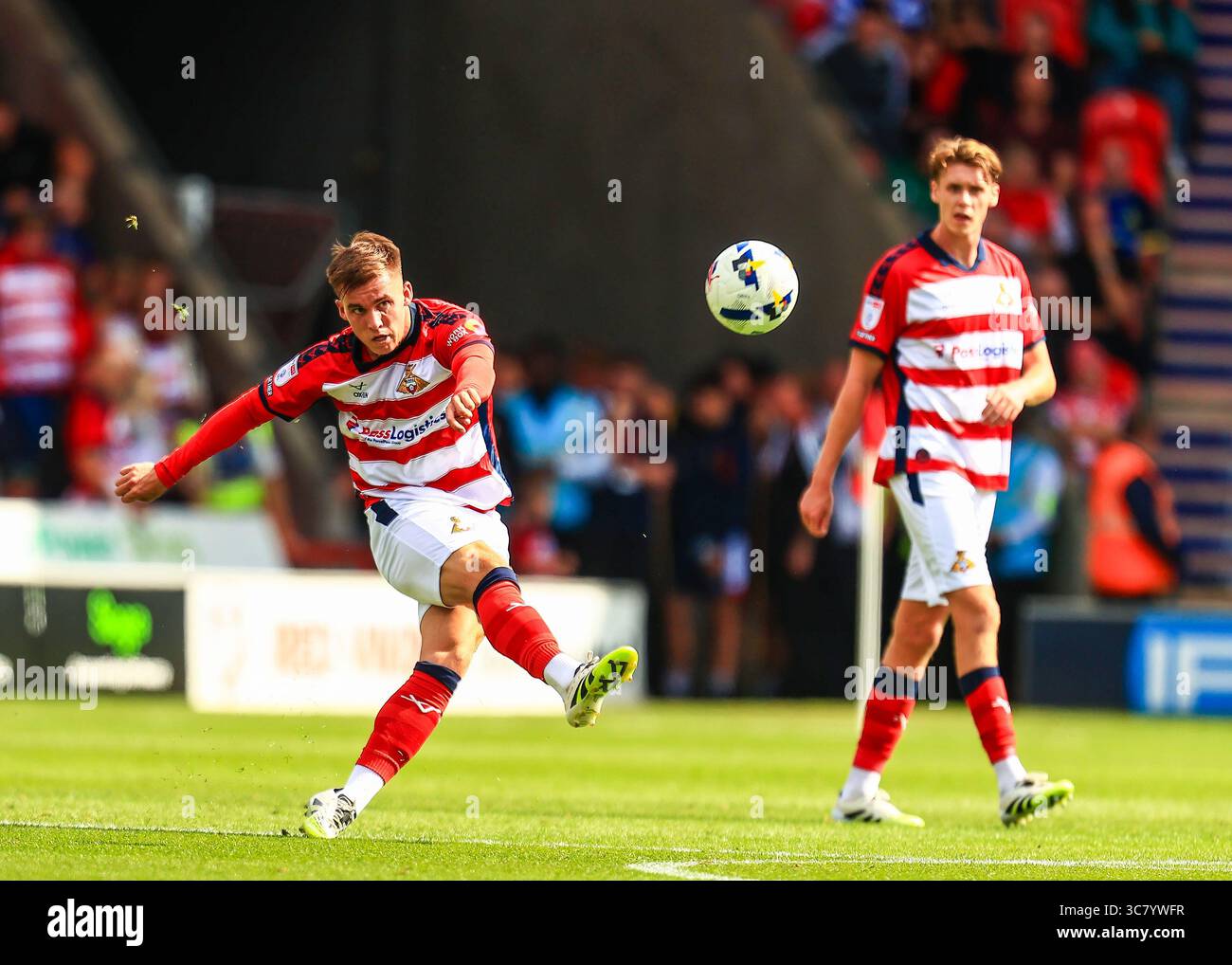 George Broadbent of Doncaster Rovers passes the ball during the Sky Bet ...
