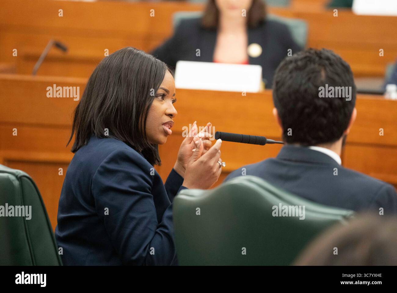 U.S. Rep. Jasmine Crockett, D-Dallas, answers questions at the witness table during the final public hearing of the House Select Committee on Congressional Redistricting at the Texas Capitol on August 1, 2025. Stock Photo