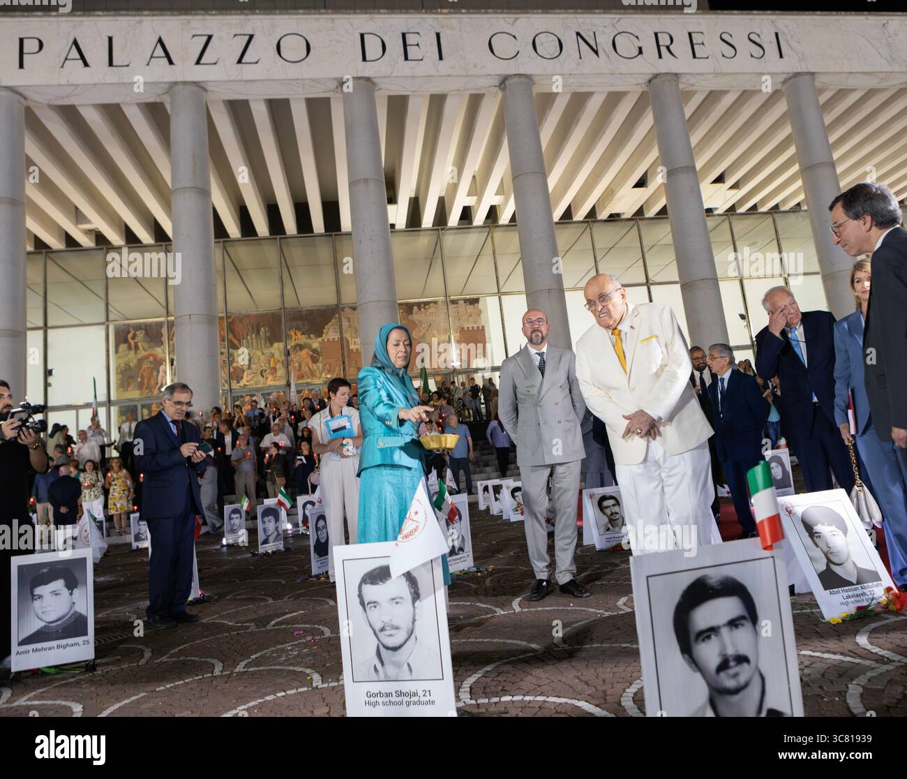 Maryam Rajavi, alongside Charles Michel and Rudy Giuliani, are seen ...