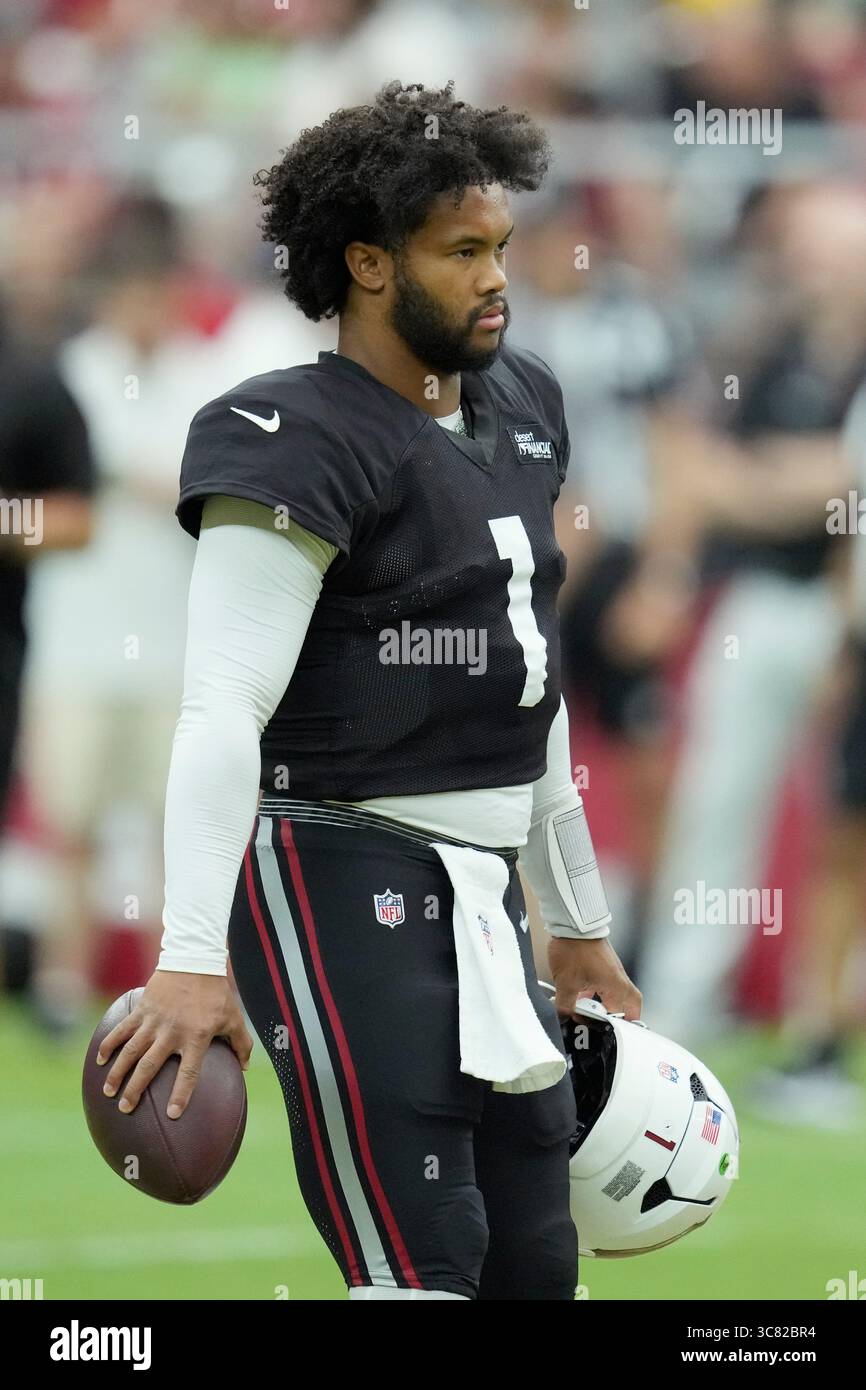 Arizona Cardinals quarterback Kyler Murray pauses on the field during practice at the team's NFL ...